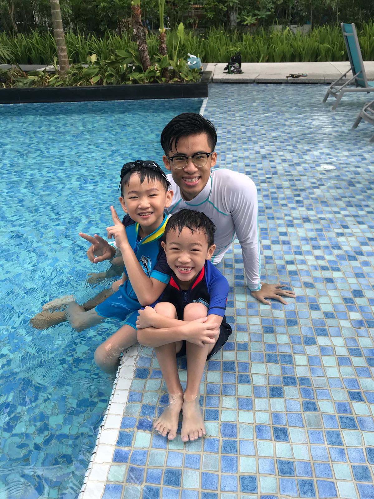 A BeyondSplash coach and young swimmer underwater